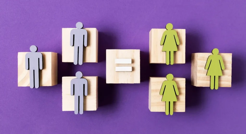 Illustration de l’égalité femmes-hommes dans la Fonction Publique Territoriale, avec symboles masculins et féminins sur fond violet, représentant les écarts de rémunération mesurés par l’index 2025.